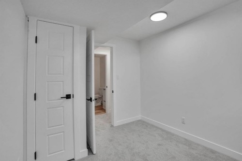 708 Sacramento Place Sw, Calgary, AB - Indoor Photo Showing Other Room