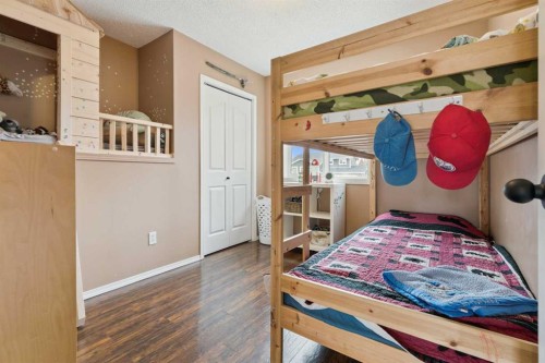 107 Downey Place, Okotoks, AB - Indoor Photo Showing Bedroom