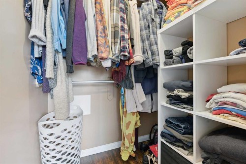 107 Downey Place, Okotoks, AB - Indoor With Storage