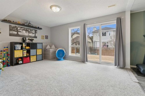 107 Downey Place, Okotoks, AB - Indoor Photo Showing Other Room