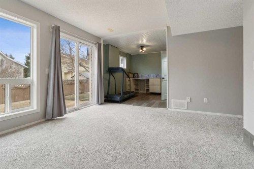 107 Downey Place, Okotoks, AB - Indoor Photo Showing Other Room