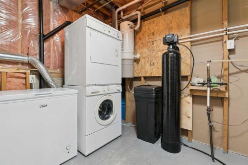 107 Downey Place, Okotoks, AB - Indoor Photo Showing Laundry Room