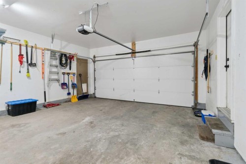 107 Downey Place, Okotoks, AB - Indoor Photo Showing Garage