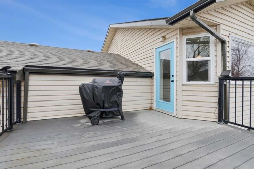 107 Downey Place, Okotoks, AB - Outdoor With Deck Patio Veranda With Exterior