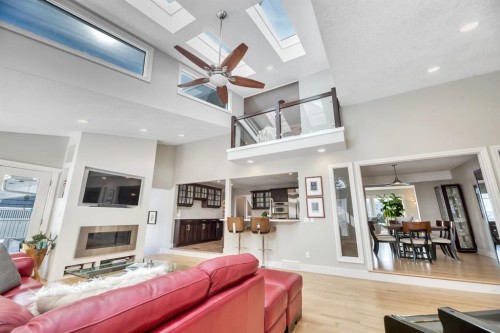 788 Parkridge Drive Se, Calgary, AB - Indoor Photo Showing Living Room With Fireplace