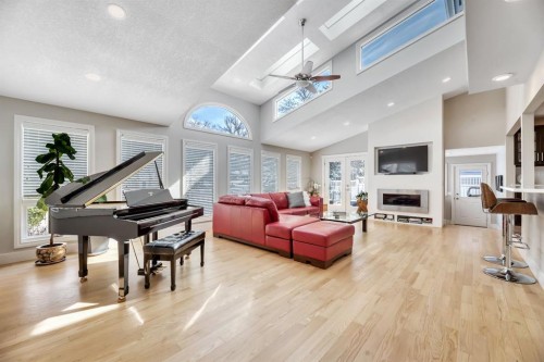788 Parkridge Drive Se, Calgary, AB - Indoor Photo Showing Living Room With Fireplace