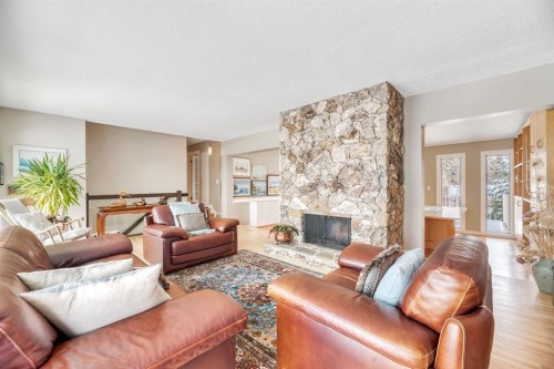 788 Parkridge Drive Se, Calgary, AB - Indoor Photo Showing Living Room With Fireplace