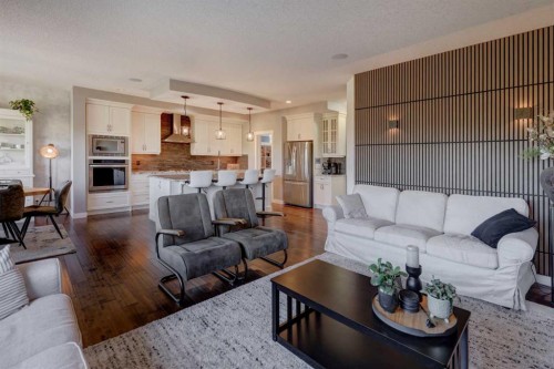 213 Kingsmere Cove Se, Airdrie, AB - Indoor Photo Showing Living Room