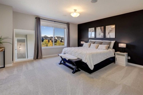 213 Kingsmere Cove Se, Airdrie, AB - Indoor Photo Showing Bedroom