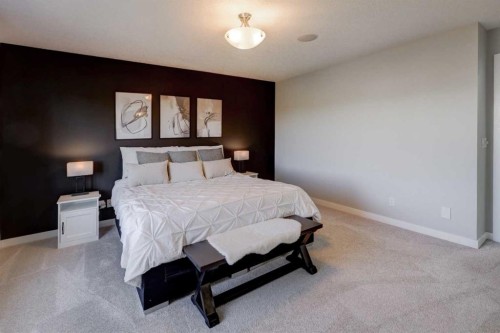 213 Kingsmere Cove Se, Airdrie, AB - Indoor Photo Showing Bedroom