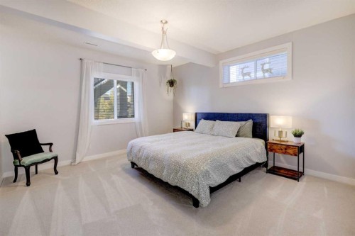 213 Kingsmere Cove Se, Airdrie, AB - Indoor Photo Showing Bedroom