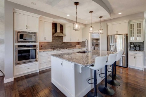 213 Kingsmere Cove Se, Airdrie, AB - Indoor Photo Showing Kitchen With Upgraded Kitchen