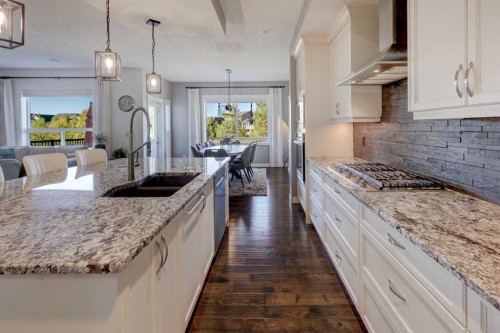 213 Kingsmere Cove Se, Airdrie, AB - Indoor Photo Showing Kitchen With Double Sink With Upgraded Kitchen