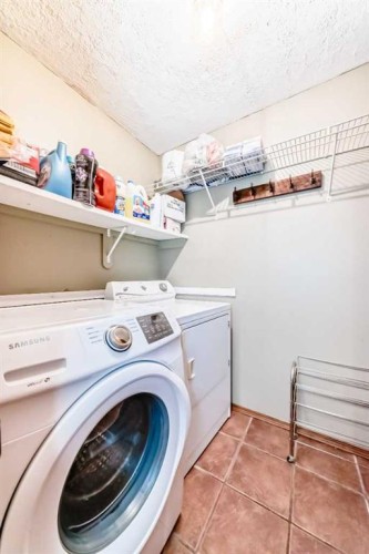 49 Applewood Court Se, Calgary, AB - Indoor Photo Showing Laundry Room