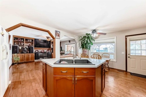 49 Applewood Court Se, Calgary, AB - Indoor Photo Showing Kitchen With Double Sink