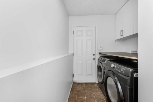 228 Saddlecrest Way Ne, Calgary, AB - Indoor Photo Showing Laundry Room
