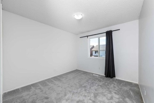 228 Saddlecrest Way Ne, Calgary, AB - Indoor Photo Showing Other Room
