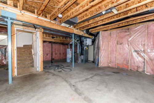 228 Saddlecrest Way Ne, Calgary, AB - Indoor Photo Showing Basement