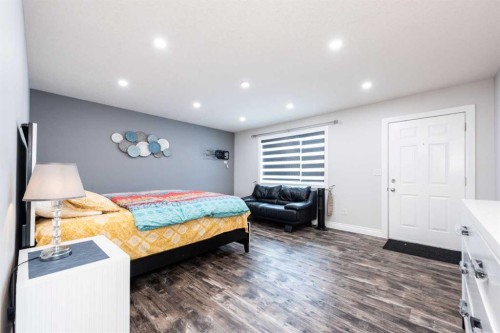 192 Cove Rise Rise, Chestermere, AB - Indoor Photo Showing Bedroom