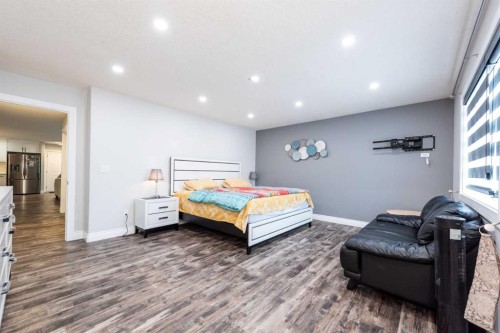 192 Cove Rise Rise, Chestermere, AB - Indoor Photo Showing Bedroom