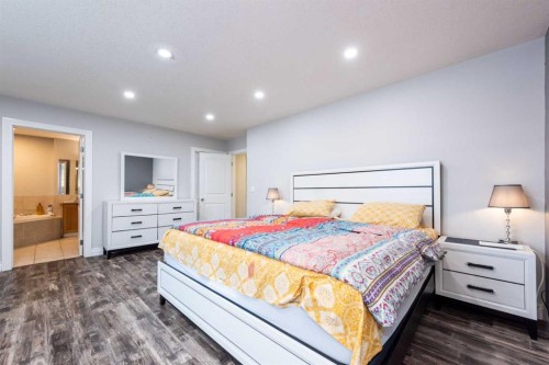 192 Cove Rise Rise, Chestermere, AB - Indoor Photo Showing Bedroom