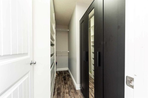 192 Cove Rise Rise, Chestermere, AB - Indoor Photo Showing Other Room