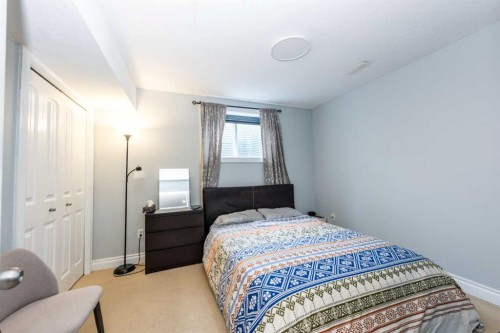 192 Cove Rise Rise, Chestermere, AB - Indoor Photo Showing Bedroom