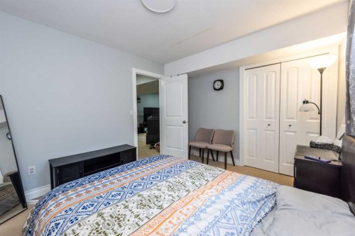 192 Cove Rise Rise, Chestermere, AB - Indoor Photo Showing Bedroom