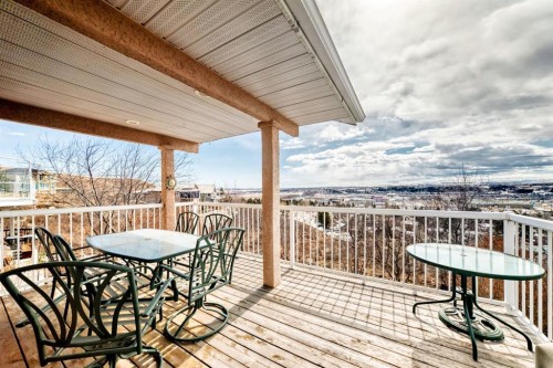 14 Headlands Close, Cochrane, AB - Outdoor With Deck Patio Veranda With Exterior