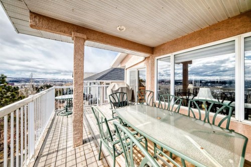 14 Headlands Close, Cochrane, AB - Outdoor With Deck Patio Veranda