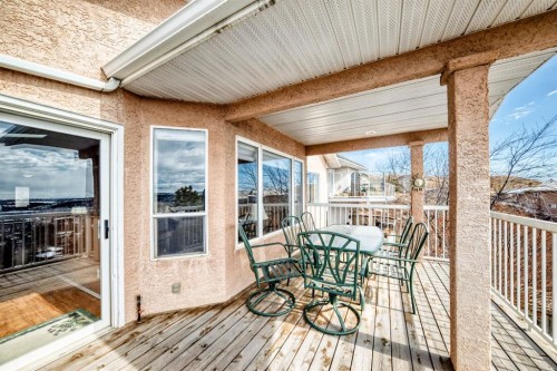 14 Headlands Close, Cochrane, AB - Outdoor With Deck Patio Veranda With Exterior