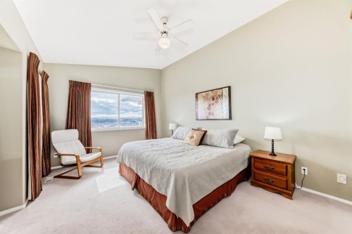 14 Headlands Close, Cochrane, AB - Indoor Photo Showing Bedroom