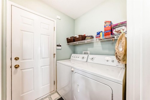 14 Headlands Close, Cochrane, AB - Indoor Photo Showing Laundry Room