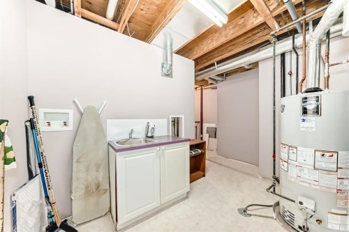 14 Headlands Close, Cochrane, AB - Indoor Photo Showing Basement