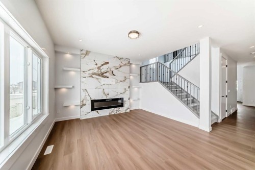 69 Lakes Estates Circle, Strathmore, AB - Indoor With Fireplace