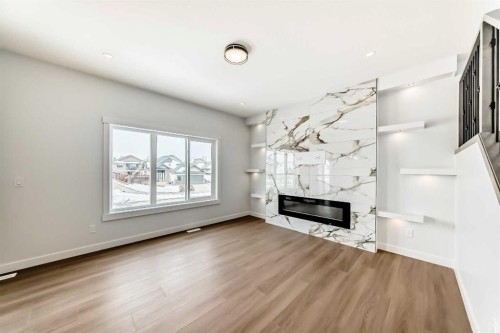 69 Lakes Estates Circle, Strathmore, AB - Indoor Photo Showing Living Room With Fireplace