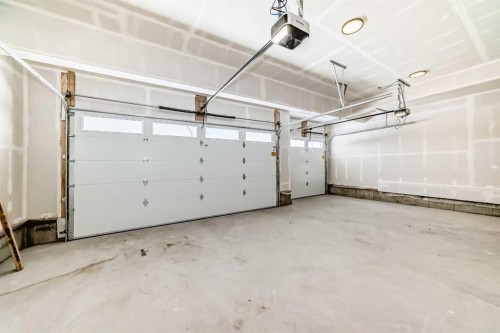 69 Lakes Estates Circle, Strathmore, AB - Indoor Photo Showing Garage