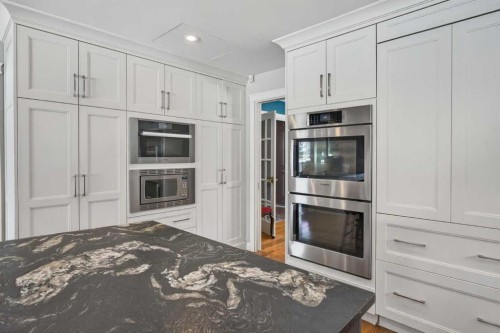 12 Midpark Place Se, Calgary, AB - Indoor Photo Showing Kitchen With Stainless Steel Kitchen