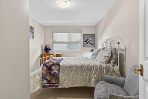 12 Midpark Place Se, Calgary, AB - Indoor Photo Showing Bedroom