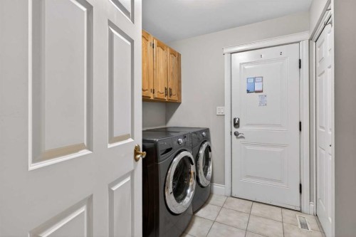 12 Midpark Place Se, Calgary, AB - Indoor Photo Showing Laundry Room