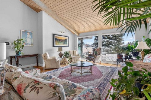 12 Midpark Place Se, Calgary, AB - Indoor Photo Showing Living Room
