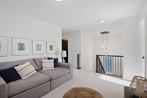 105 Heritage Boulevard, Cochrane, AB - Indoor Photo Showing Living Room
