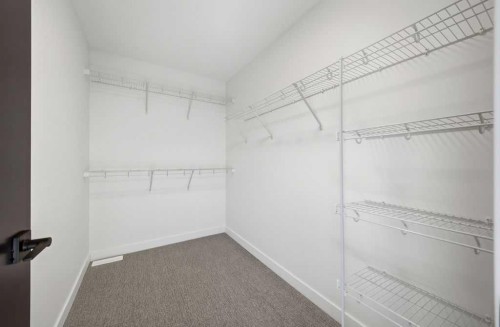 105 Heritage Boulevard, Cochrane, AB - Indoor With Storage