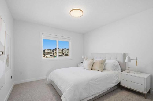 105 Heritage Boulevard, Cochrane, AB - Indoor Photo Showing Bedroom