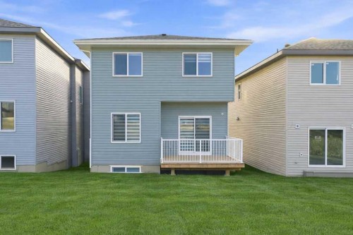 105 Heritage Boulevard, Cochrane, AB - Outdoor With Exterior