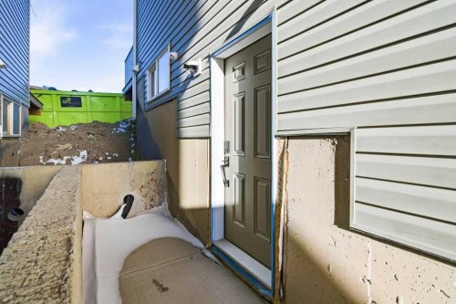 105 Heritage Boulevard, Cochrane, AB - Outdoor With Exterior