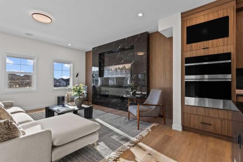 105 Heritage Boulevard, Cochrane, AB - Indoor Photo Showing Living Room