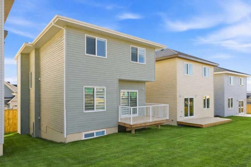 105 Heritage Boulevard, Cochrane, AB - Outdoor With Exterior