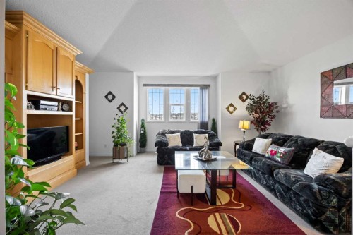 465 Panamount Boulevard Nw, Calgary, AB - Indoor Photo Showing Living Room