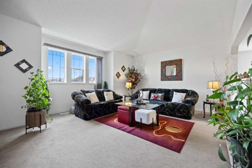 465 Panamount Boulevard Nw, Calgary, AB - Indoor Photo Showing Living Room